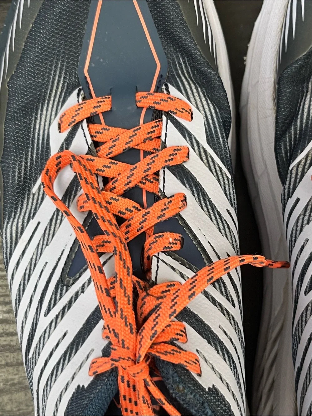 Hoka Navy Running Sneakers with Orange Laces